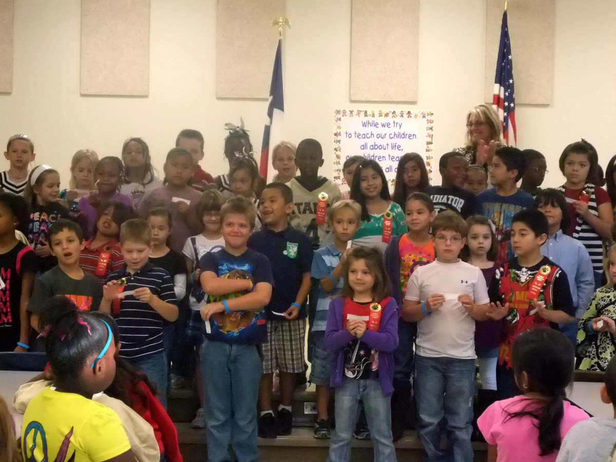 Image: First, Second and Third  Graders — These students earned perfect attendance ice cream coupons that allows then one free ice cream at lunch.