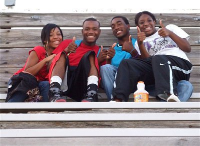 Image: Fans in the stands — Varsity Gladiators De’Andre Sephus and Heath Clemons enjoy the JV game with Ryisha Copeland and Jameka Copeland.