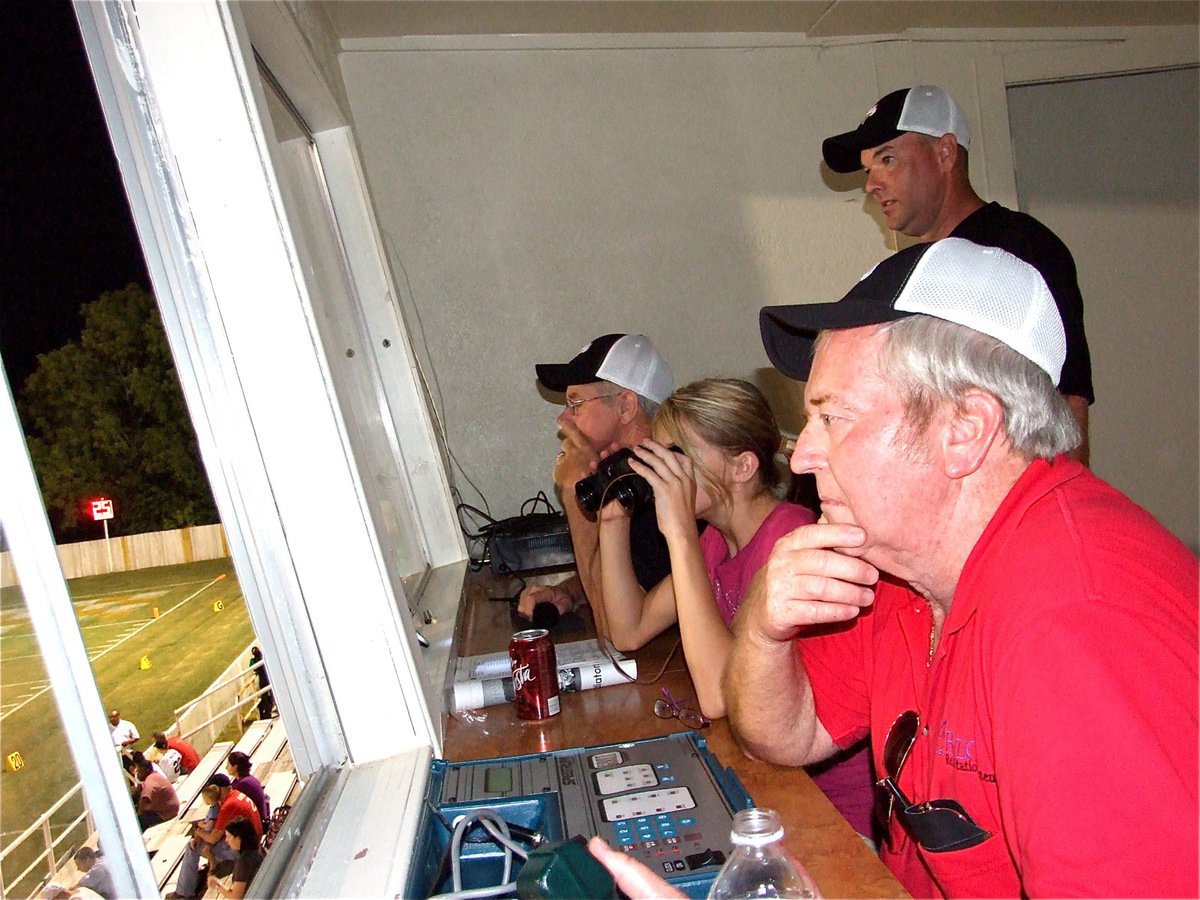 Image: Halee In the box — Halee Turner joins Paul Cockerham, Richard Dabny and Greg Richards high in the press box to get a closer look thru the binoculars.