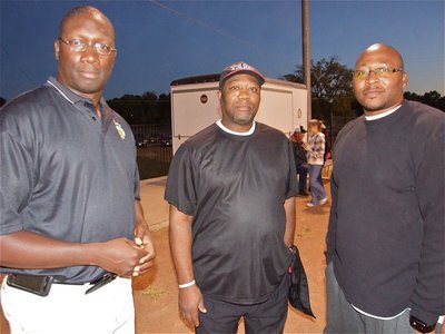Image: Proud family — Italy Gladiator assistant coach Erik Wilson visits with Clarence and Andre Heard before the game. Clarence, the father of Gladiator football star Jalarnce Jamal Lewis(30), is currently a TASO referee and has been officiating high school sports for 28-years. Andre, Jalarnce’s brother, has been a coach for the Boys &amp; Girls Club in Bryant, Texas since 1996.