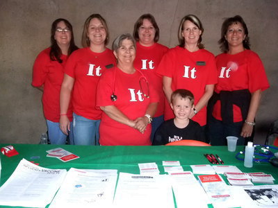 Image: Integra Care — Charlotte Prichart, Ms. Mc Murray, Rhonda Gibbs, Linda Sheffield, Laura Gibbs, Robin Kirkland and Aiden Prichart made up the Integra Care booth. They were taking blood pressure checks and handing out information about Home Health Care.