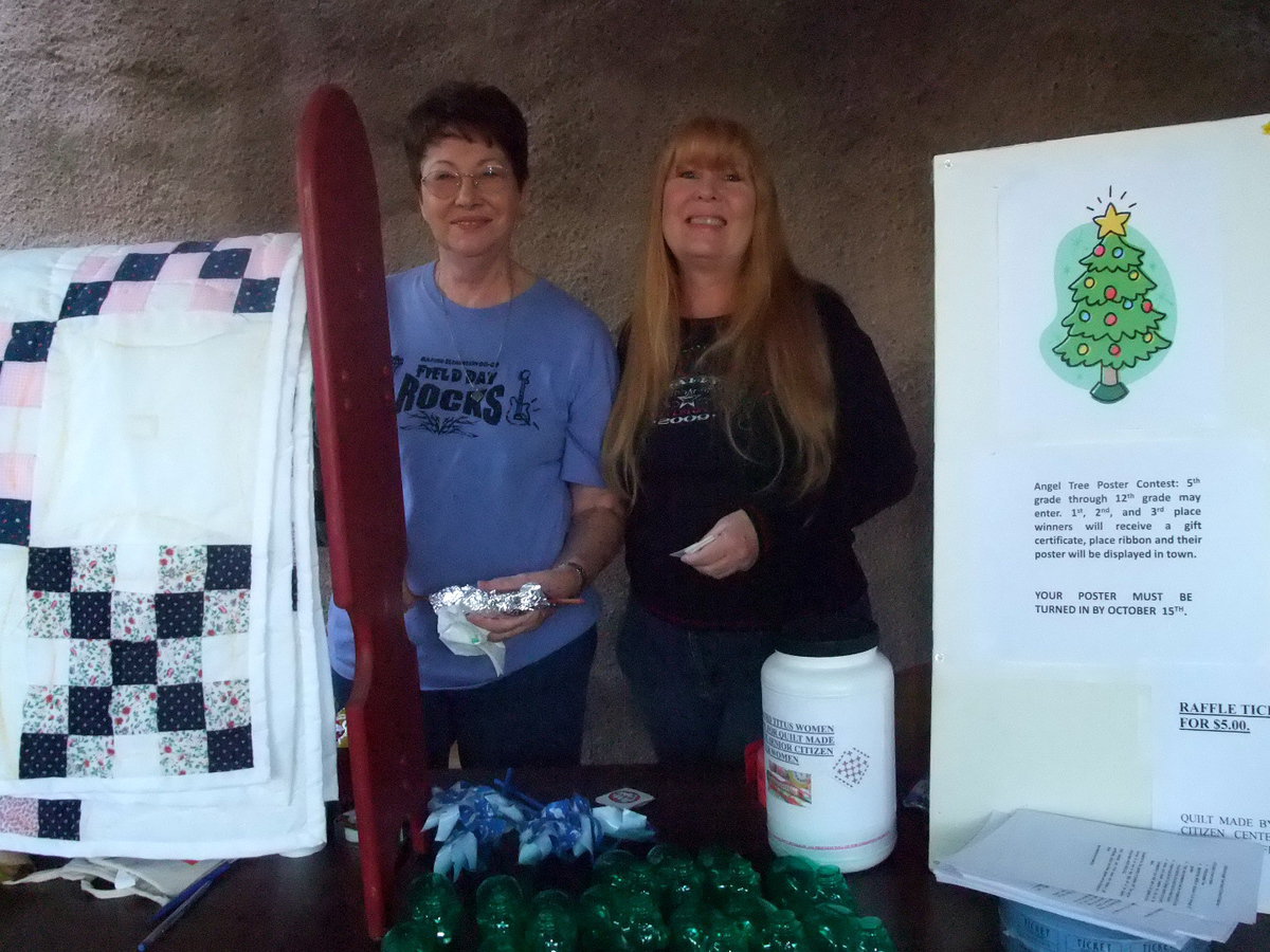 Image: Maxine and Jeannie — Maxine Morris and Jeannie Richardson of the Milford Titus Women were raffling off a beautiful quilt made by the senior citizens of Milford.