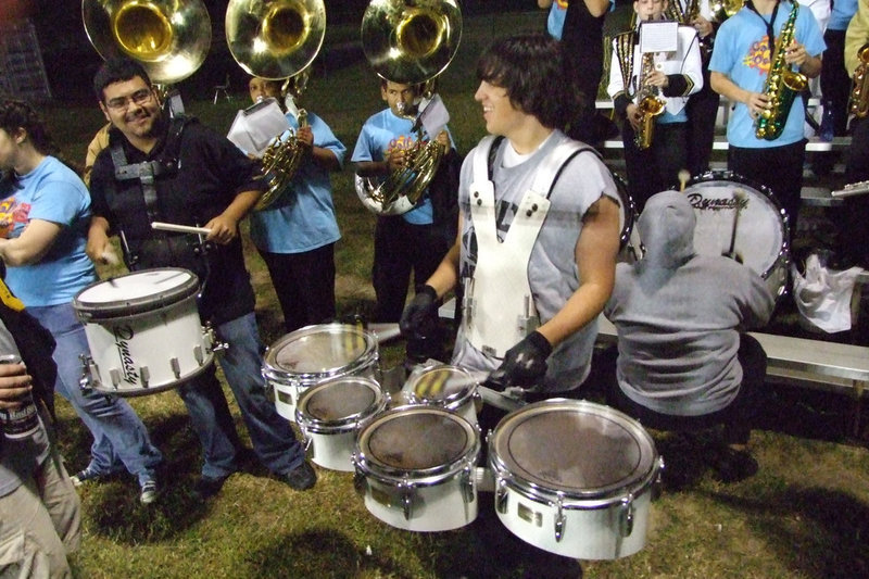 Image: Trevor and Mr. Perez — The band has a lot of fun during the games.