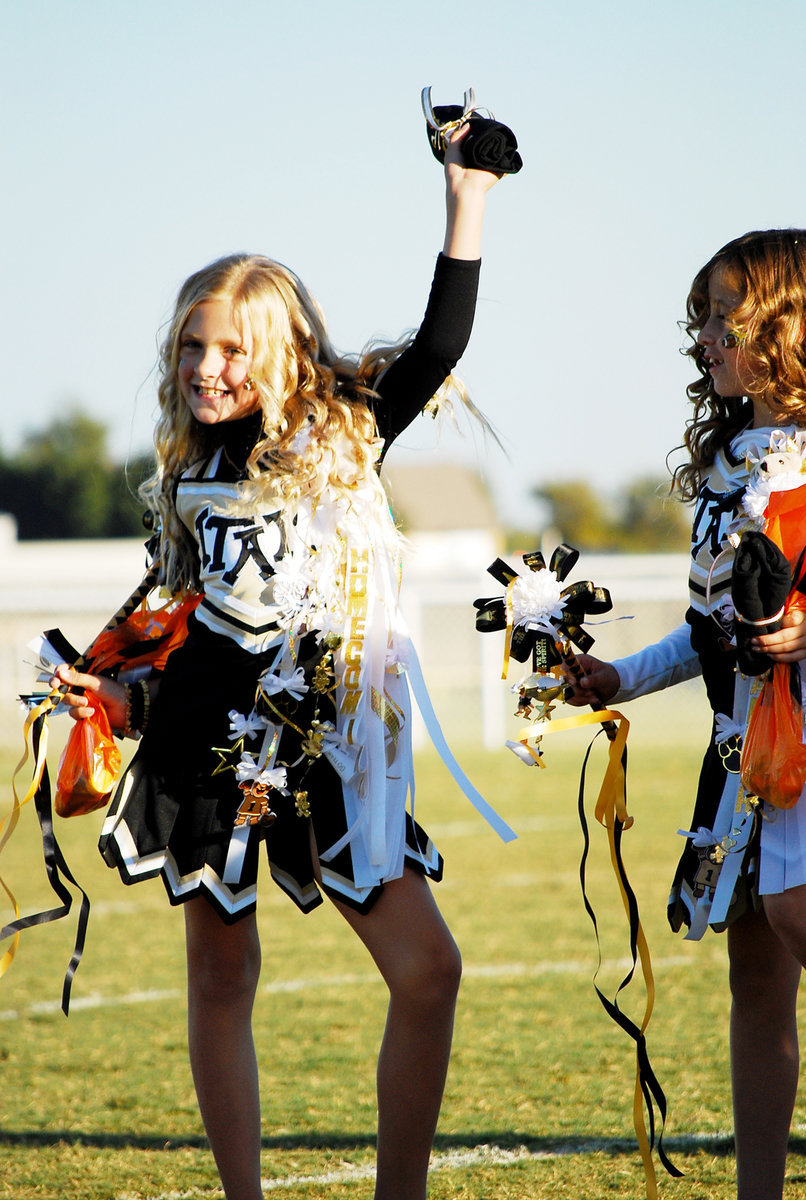 Image: Annie and Grace — IYAA hosted Rice Bulldogs on Saturday for Homecoming. Annie Perry and Graice Haight get introduced at Homecoming.