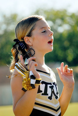 Image: Brooke Deborde — Cheerleader Brooke DeBorde keeps the spirit up.