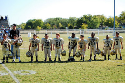 Image: In the bag — C-team prepares to receive “Spirit Sacks” after their Homecoming victory over the Rice Bulldogs.