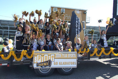 Image: Winning Float — The IYAA Cheerleaders won “Best Spirit” during the IHS Homecoming parade.