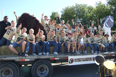 Image: Best Float — The IYAA Football boys won “Best Float” in the IHS Homecoming parade.