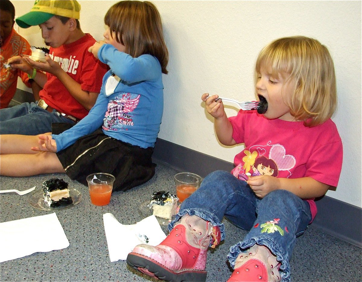 Image: Classic kids — The kids of the IYAA enjoy the deserts and punch inside the council chambers of Italy City Hall.