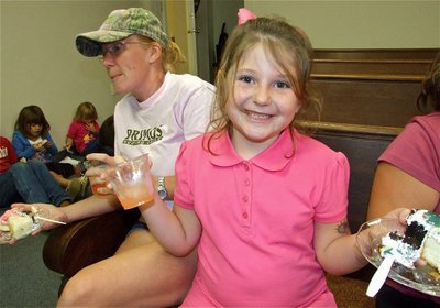 Image: It’s a good day — Misty Gwin and her daughter Kammie enjoy their deserts during the “IYAA Day” celebration.