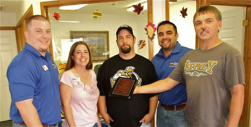 Image: Thank you CNB — Parker Reeves, Sarah Romero, and Diego Garcia with Citizens National Bank of Texas(CNB) in downtown Italy accept CNB’s appreciation plaque from IYAA President Gary Wood and IYAA Vice President Barry Byers. Parker and Diego recall having to play in other towns as youngsters and are glad Italy has a youth athletic organization.