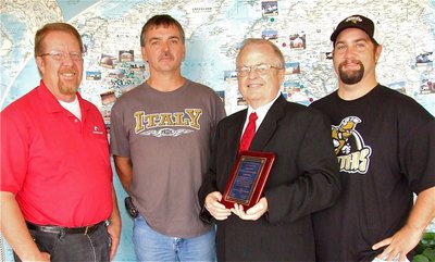 Image: Thank you Monolithic Constructors, Inc. — Gary Clark and David South of Monolithic Constructors, Inc. proudly receive their appreciation plaque from IYAA President Gary Wood and IYAA Vice President Barry Byers.