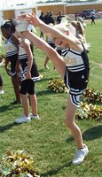Image: Courtney kicks — Courtney Riddle helps kickoff the IYAA’s 2010-2011 season.