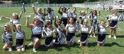 Image: Minor Cheerleaders — The IYAA cheerleaders ring their victory bells!
