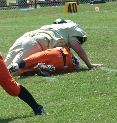 Image: Pittmon gets sack — Aaron Pittmon sacks the Ferris quarterback and Pittmon’s teammates recover the resulting fumble.