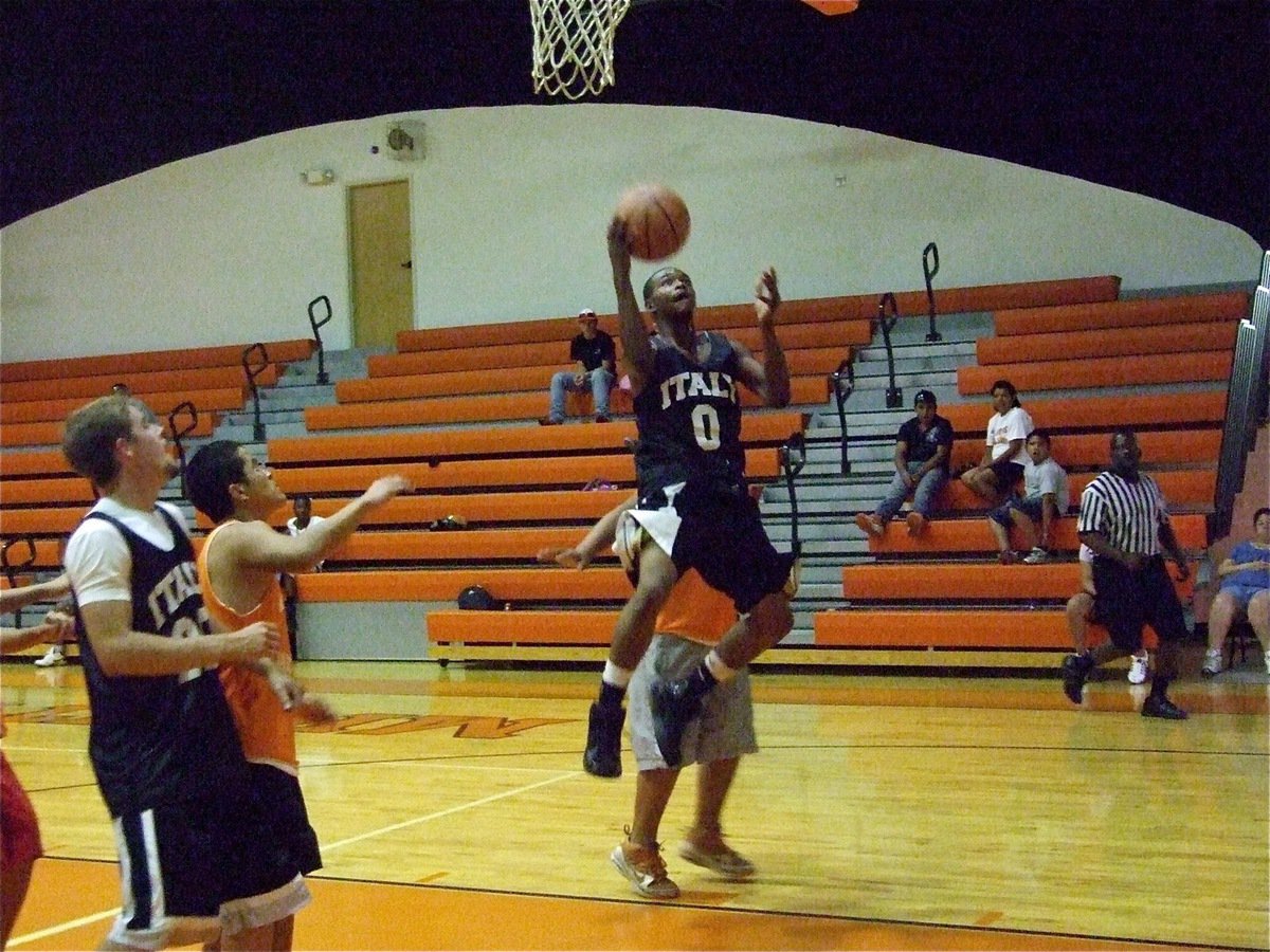 Image: De’Andre defies — De’Andre Sephus(0) uses his body to shield off an Eagle defender on his way to the basket.