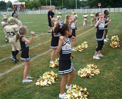 Image: Ruff &amp; Tuff — The IYAA Cheerleaders strut their stuff for Gladiator fans.