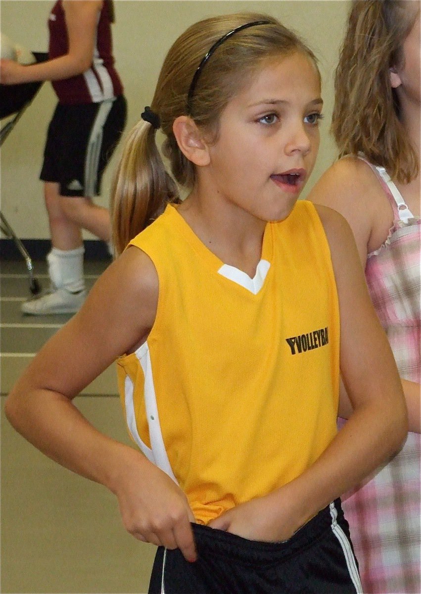 Image: Let’s do this — Haley Bowles has had enough pre-game discussion and gets ready to play some volleyball.