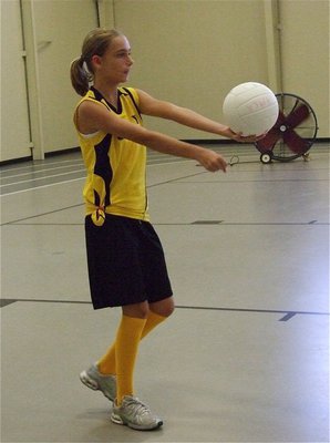 Image: Cassidy serves — Cassidy uses good form during her serve.