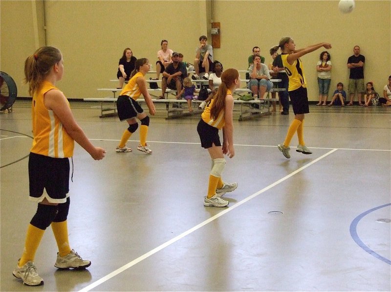 Image: Cassidy keeps ball in — Cassidy defends the opposite side of the floor while in the attack zone of the formation.