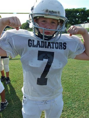 Image: Pumped up — 8th grader John Escamilla(7) plans on flexing his muscle against the Mustangs.