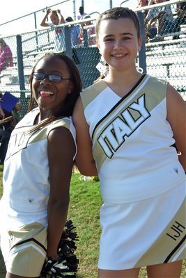 Image: K’Breona and Amber — K’Breona Davis and Amber Hooker have fun while cheering for the Gladiators.