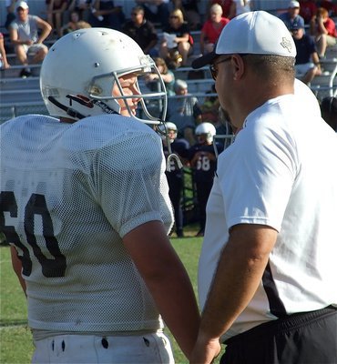 Image: Father and son — Kelton Bales(60) is the son of Italy’s Athletic Director and Varsity Head Coach Craig Bales who offers some advice to his boy.