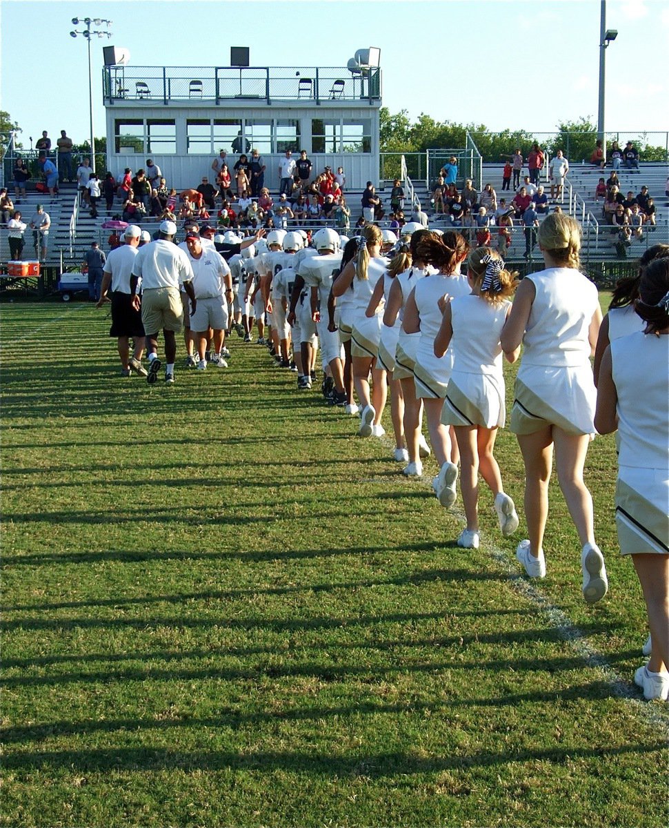 Image: Casting a shadow — The Gladiators and their cheerleaders cast their shadows beyond the Ellis County line.