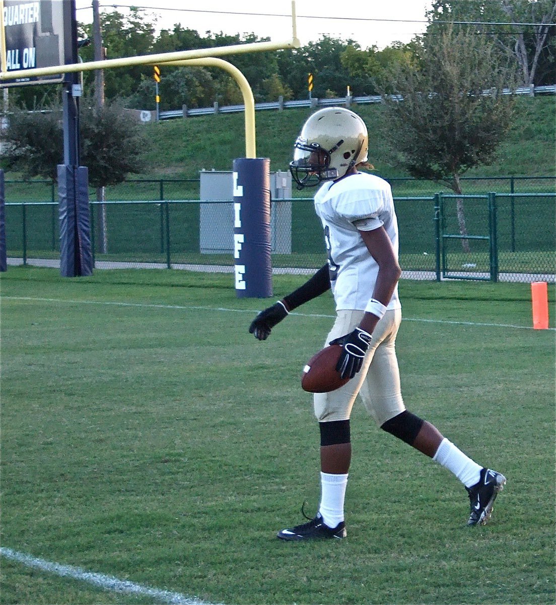 Image: Trevon scores — Trevon Robertson(9) catches his first of two touchdown catches against the Mustangs.