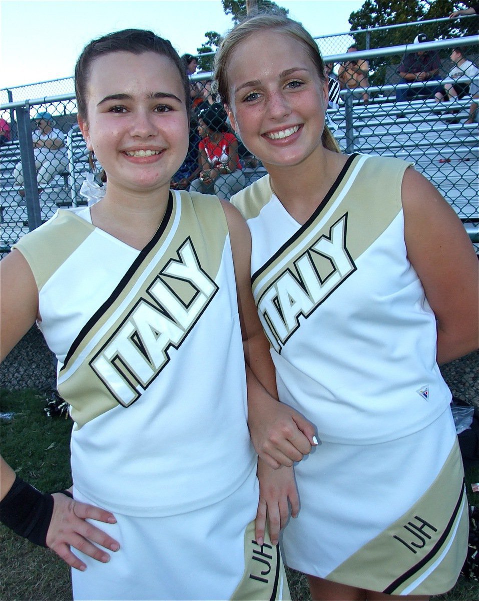 Image: Together we can — Amber Hooker and Madison Washington cheer on the Gladiators.