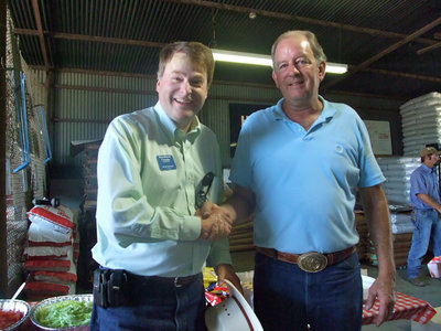 Image: Brian Birdwell and James Hobbs — Lots of hand shaking going on.