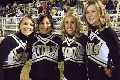 Image: Happy cheerleaders — Lindsey Brogden, Blanca Figueroa, Lexie Miller and Kaitlyn Rossa