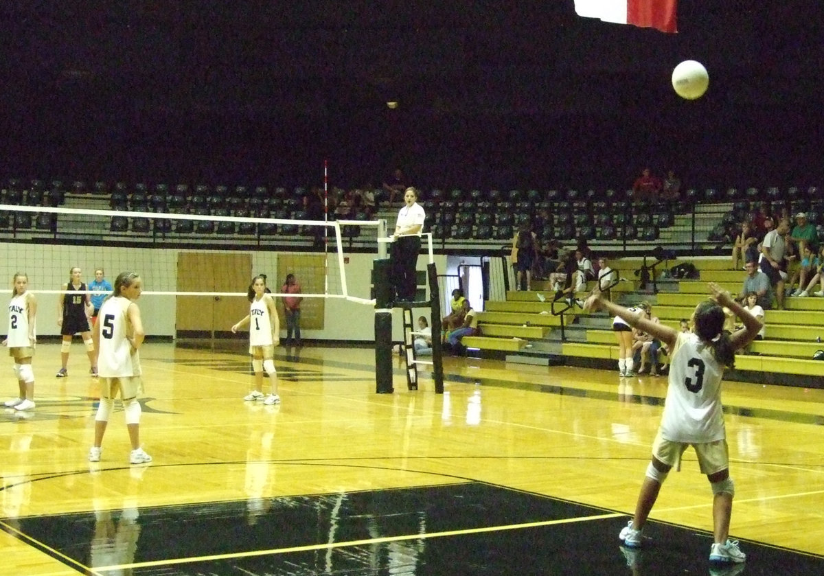 Image: Jacinto serves — Ashlyn Jacinto (3) takes care of the serve this time.