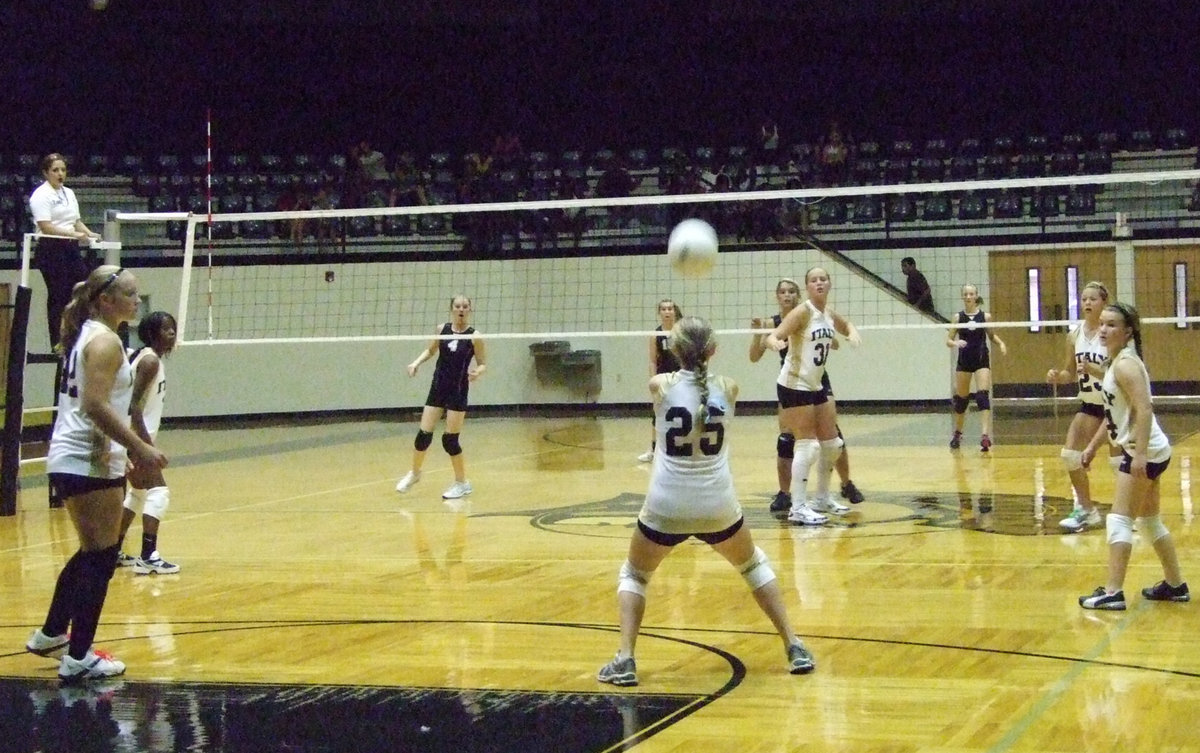 Image: Kelsey is ready for this — Kelsey Nelson (25) tries to bump the ball back over to Grandview.