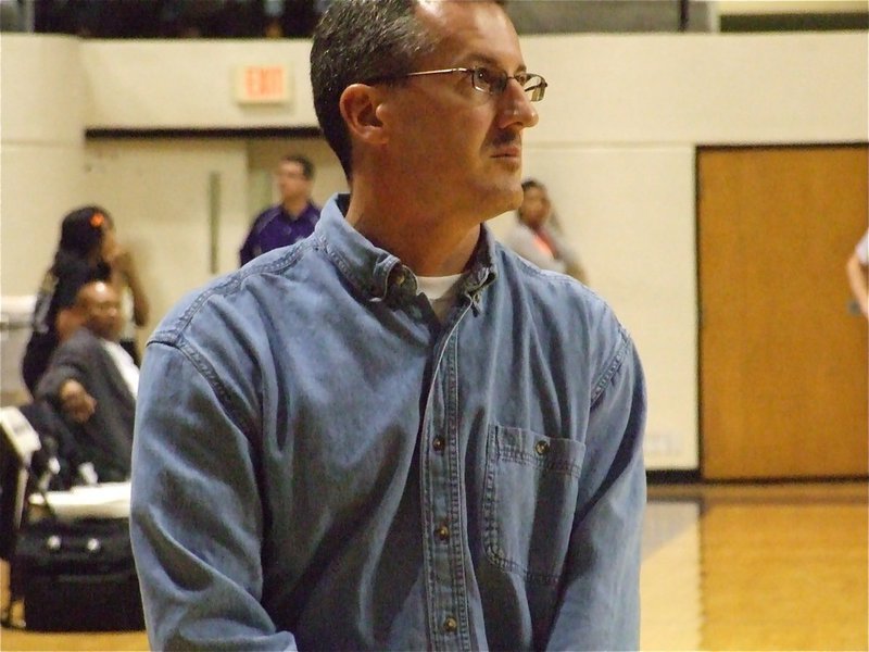 Image: Watching the team — Head Coach Kyle Holley has a million things running through his mind before the Eula game.