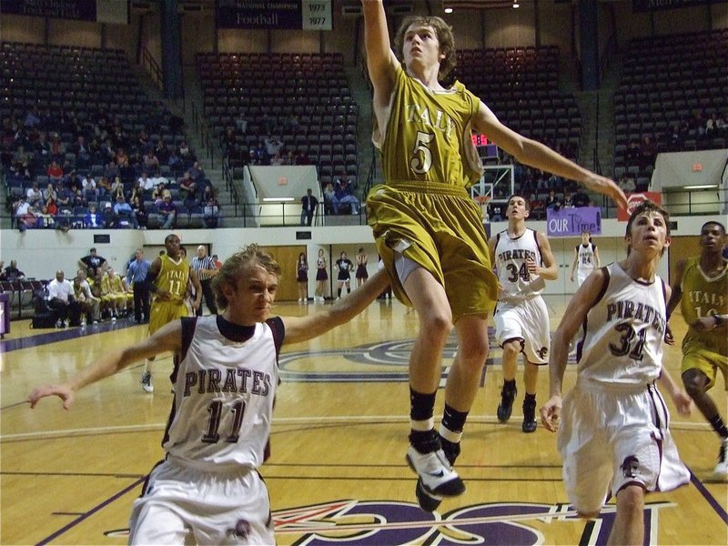 Image: Colton Campbell — Colton Campbell explodes out of frame to the rim for a lay up.