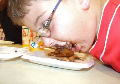 Image: Go, Gage! — Gage Wafer dives right in and devours his three stack of chocolate chip cookies.