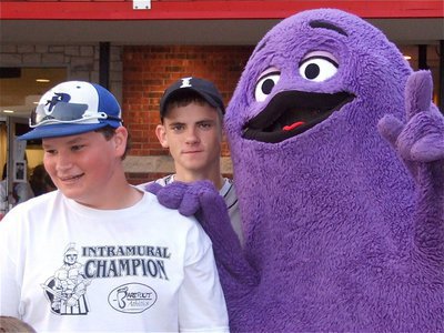 Image: Whazzup! — IYAA players John Byers and Justin Wood hang with Grimace.