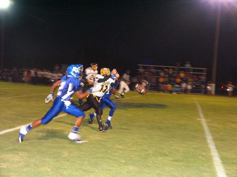 Image: The pass was incomplete — Had the Eagles pass connected, the receiver was still flanked by two Bulldog defenders. Milford’s smothering defense held Jonesboro’s offense behind the 50 all night. A long night for the visiting Jonesboro Eagles during a Homecoming game played against a very stingy host — the Milford Bulldogs.