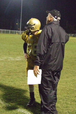 Image: Ashcraft and Coach Sollers — Ryan Ashcraft gets instruction from Coach Sollers.