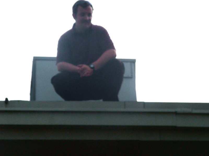 Image: Jonathan McLean — Mr. McLean is enjoying his view from the rooftop and reveling in his students success.