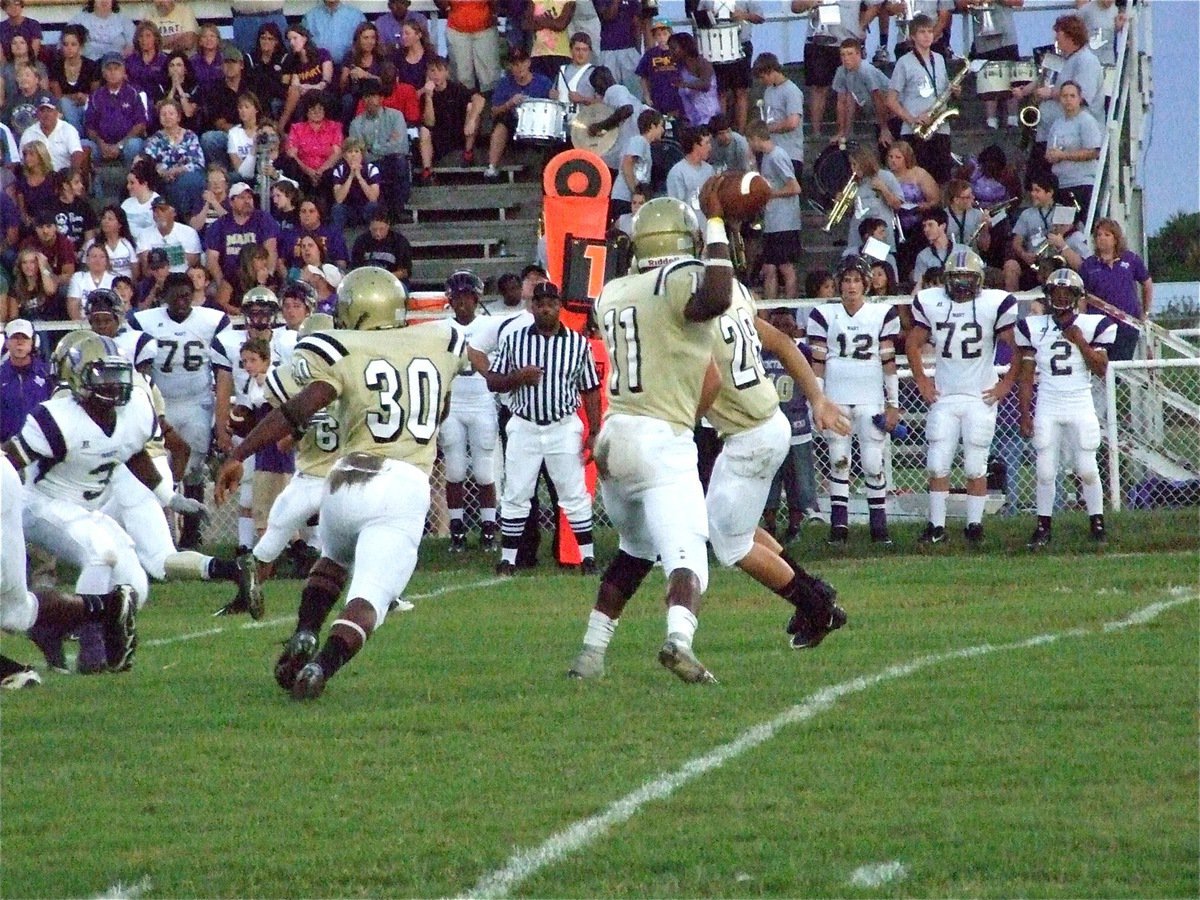 Image: Jasenio Anderson leads Italy’s offense downfield against Mart — The Italy Gladiators had tough sledding against the Mart Panthers defense throughout Friday night’s game. However, Italy’s quarterback Jasenio Anderson tallied one rushing touchdown and passed for another.