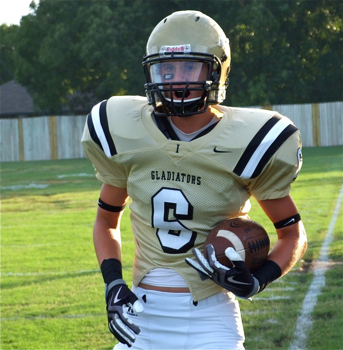 Image: Six for 6-points — Jase Holden(6) goes thru drills before the game and later hauled in a touchdown pass for 6-points in the second quarter.