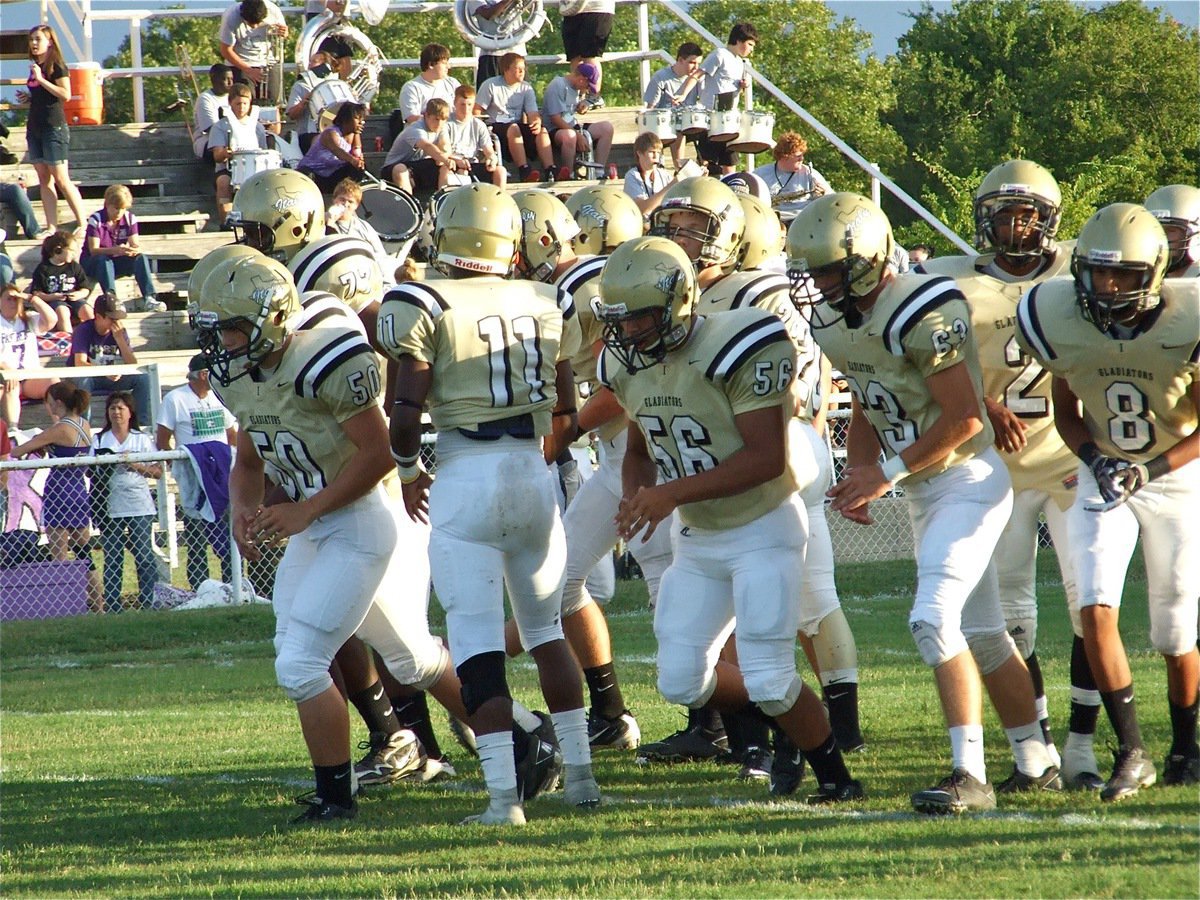 Image: Breaking out — Italy’s offense breaks the huddle in anticipation of breaking thru Mart’s defense.