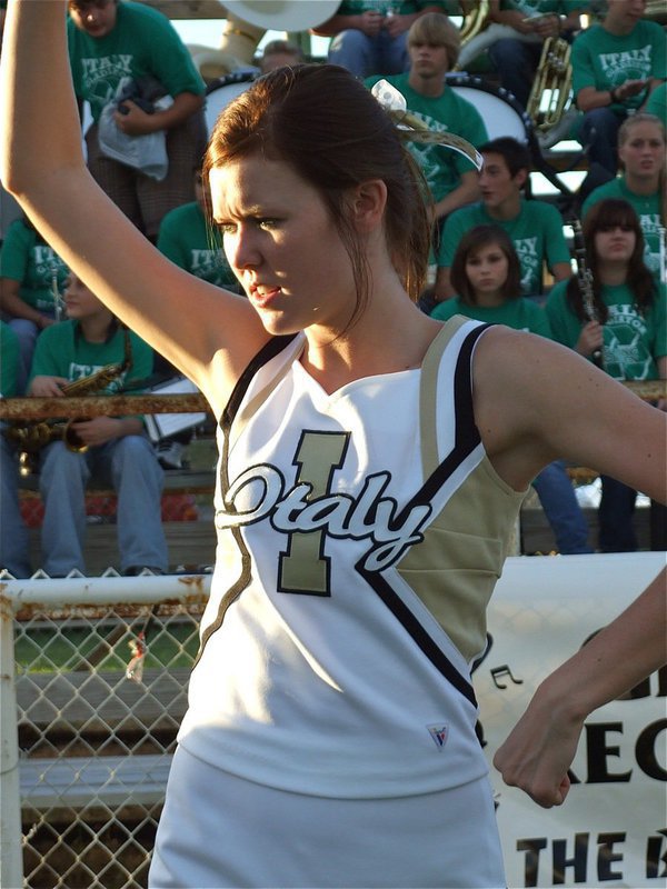Image: Rossa gets ready — IHS Cheerleader Kaitlyn Rossa performs a pre-game cheer.