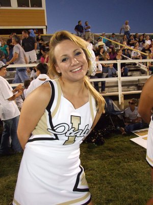 Image: Mary Tate — IHS Cheerleader Mary Tate keeps the spirit up on the Italy sideline.