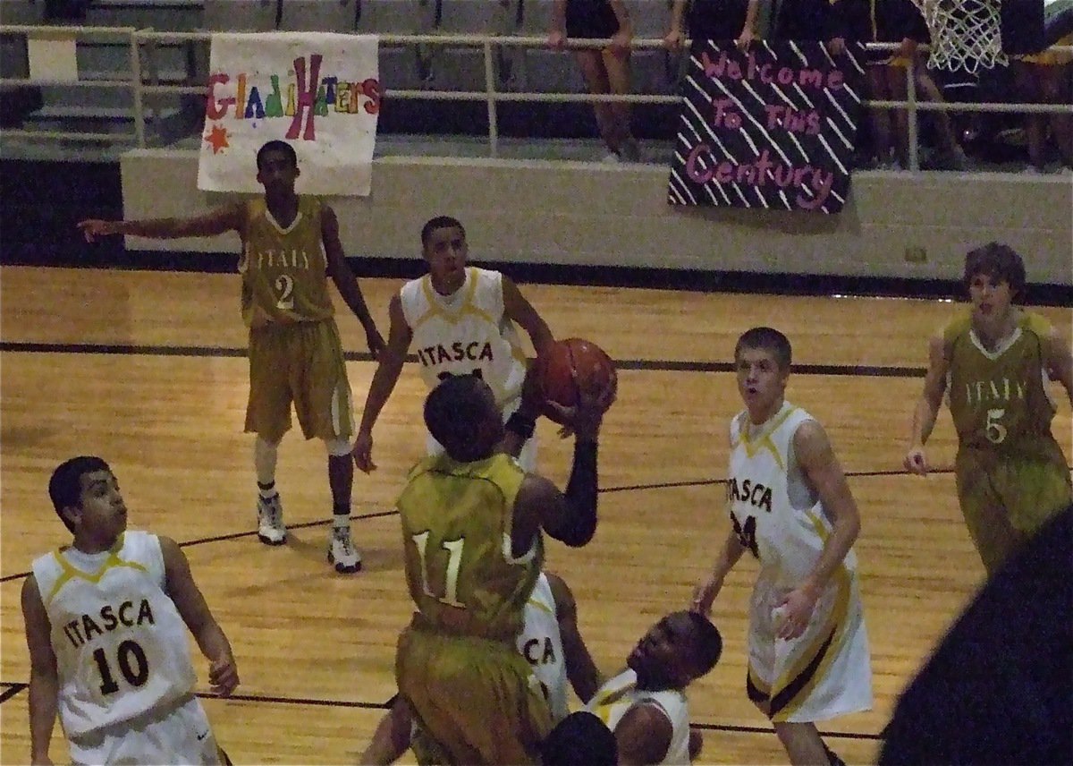 Image: Beast Mode — Jasenio “Beast” Anderson(11) goes up strong to score 2 of his 28-points against Itasca.