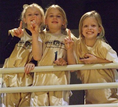 Image: Fans in the stands — Courtney Riddle, Lacy Mott and Alex Jones were wearing their IYAA basketball uniforms in support of the Gladiators.