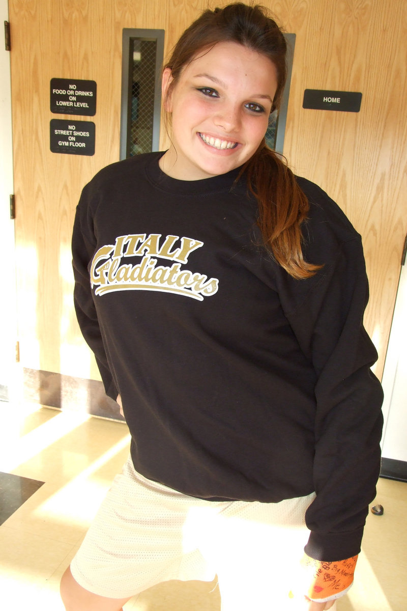 Image: Cori shows sweatshirt — You can purchase this sweatshirt at the concession stand at the home volleyball games for $12.