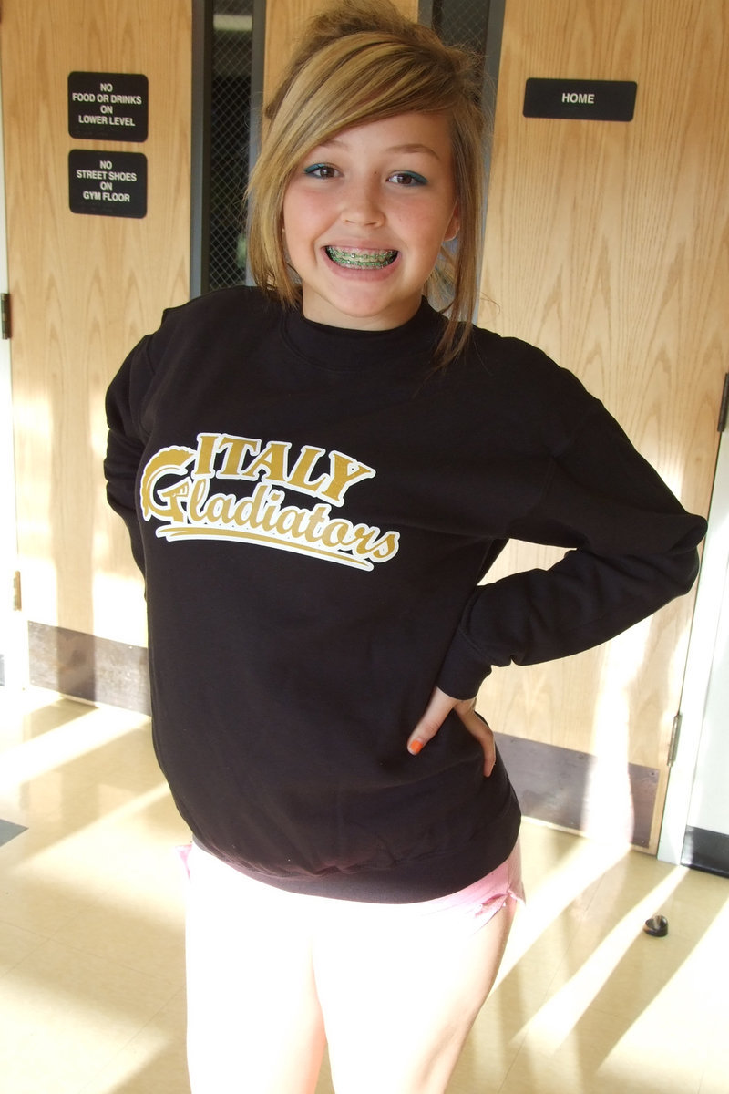 Image: Taylor shows off sweatshirt — Smitherman and Jeffords keep warm with their new sweatshirts from Italy Athletic Booster Club.